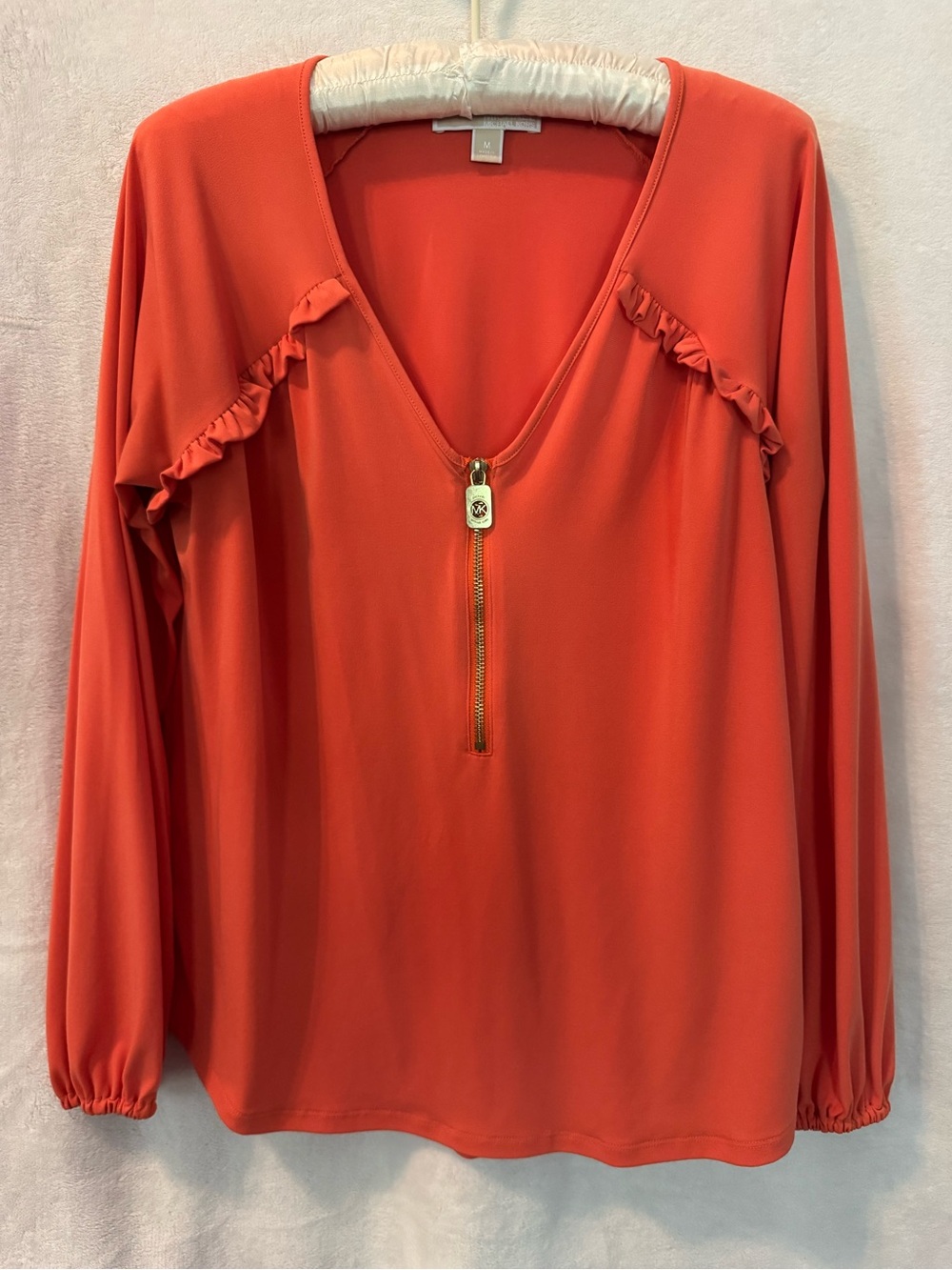MK Women’s Long-Sleeve Zip Front Ruffle Top